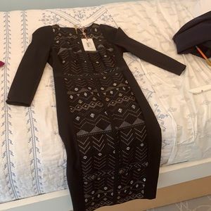 Beautiful Ted Baker modest and sleek dress. Tag on